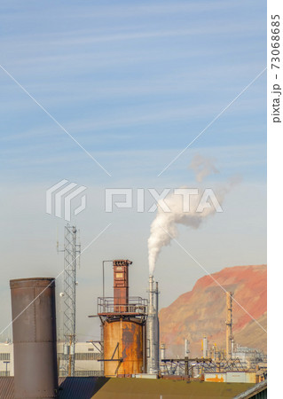 Power Plant in Utah against mountain and sky 73068685