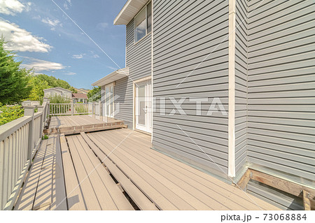 Outdoor deck construction on modern town house 73068884