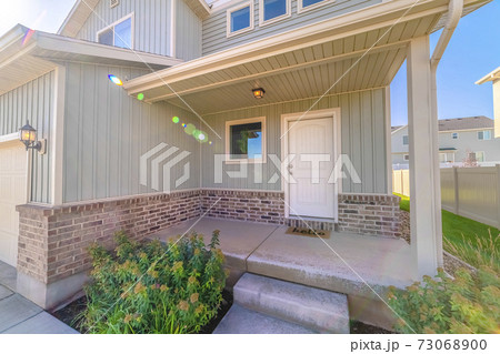 Front door and porch of modern two storey home Front door and porch of modern two storey home 73068900