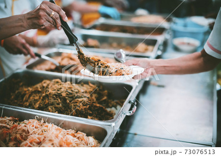 Providing free food to the poor Providing free food to the poor 73076513