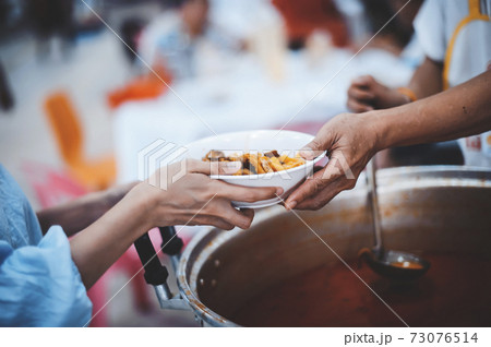 Providing free food to the poor 73076514