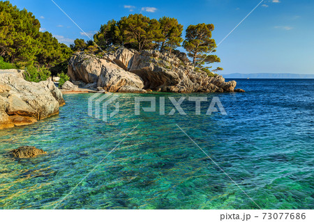 Beautiful rocky peninsula beach,Brela,Dalmatia region,Croatia,Europe Beautiful rocky peninsula beach,Brela,Dalmatia region,Croatia,Europe 73077686