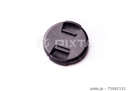 Black camera lens cover isolated 73082152
