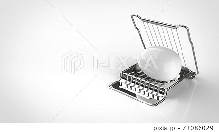 egg slicer and egg white background egg slicer and egg white background 73086029
