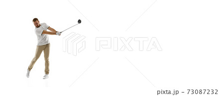 Golf player in a white shirt practicing, playing isolated on white studio background 73087232