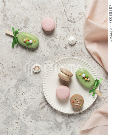 French sweet macaroons on the ligh table 73088287