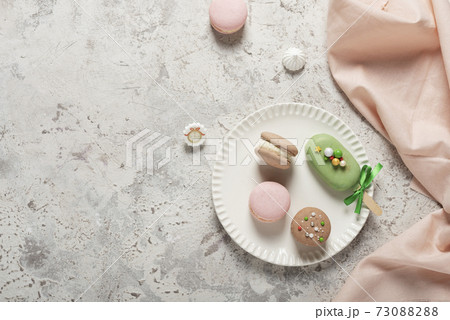 French sweet macaroons on the ligh table 73088288