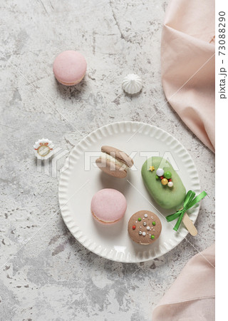 French sweet macaroons on the ligh table 73088290