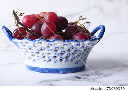 fresh grape fruit in a bowl , fresh grape fruit in a bowl , 73089370