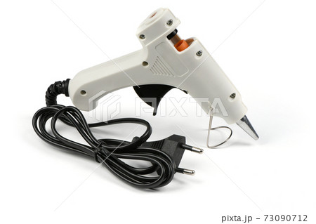 Electric hot glue gun isolated on white background. 73090712