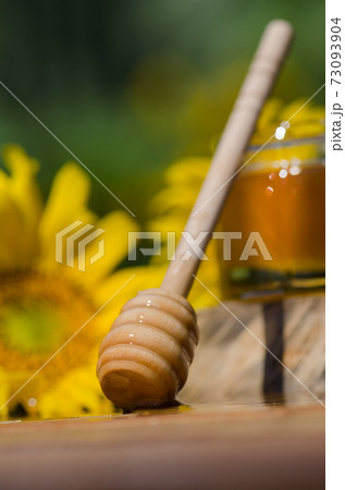 Different kinds of honey on wooden background. Healthy organic honey 73093904