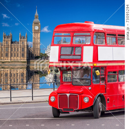 Big Ben with old red double decker bus in London, England, UK 73095294