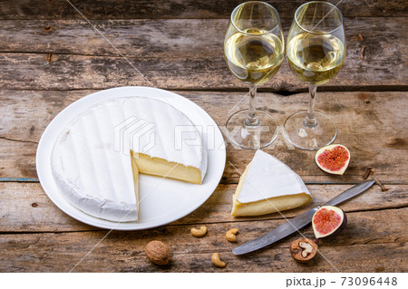 Soft french cheese with white mold Brie with wine Soft french cheese with white mold Brie with wine 73096448