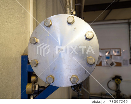 Chrome steel pipeline end cap screwed with large screws. 73097246