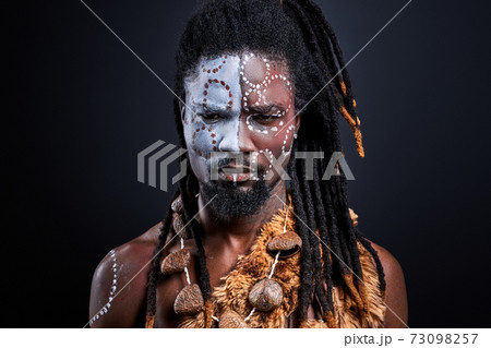 shaman tribal ritual man isolated in studio shaman tribal ritual man isolated in studio 73098257