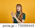 Hand points index finger up, pointing forefinger surprise gift option, idea. 73099449