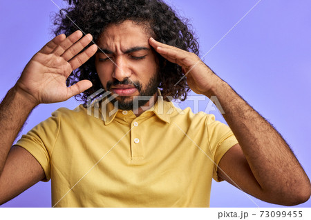 exhausted man is tired to endure the pain exhausted man is tired to endure the pain 73099455