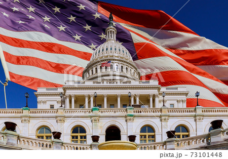 The US Capitol in Washington DC with American flag The US Capitol in Washington DC with American flag 73101448