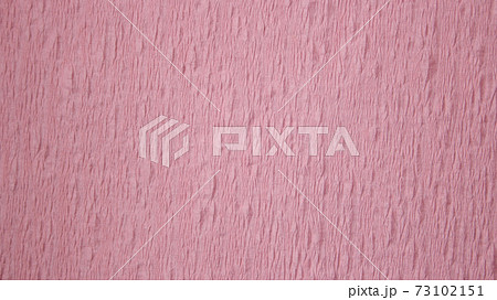 和紙 皺のある質感 くすんだピンクの写真素材