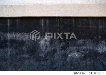 汚れた黒い壁の写真素材