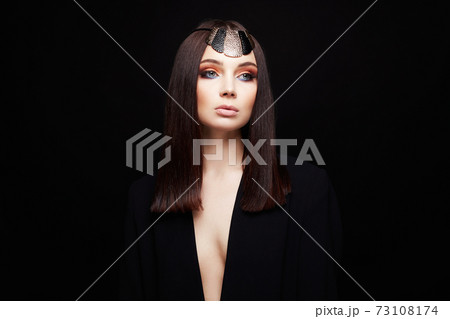 Beautiful sexy woman with crown on her head 73108174