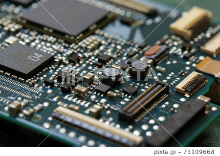 Electronics background technology close up of the green kit circuit board. 73109668