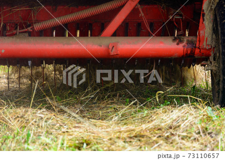 The process of pressing hay into bales, the work of the press machine, the mechanism and details of the press. The process of pressing hay into bales, the work of the press machine, the mechanism and details of the press. 73110657