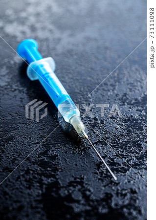 Injection syringe. Covid-19 coronavirus vaccination. Corona virus vaccine. Injection syringe. Covid-19 coronavirus vaccination. Corona virus vaccine. 73111098