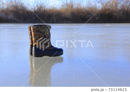 image of boots frozen lake 73114623