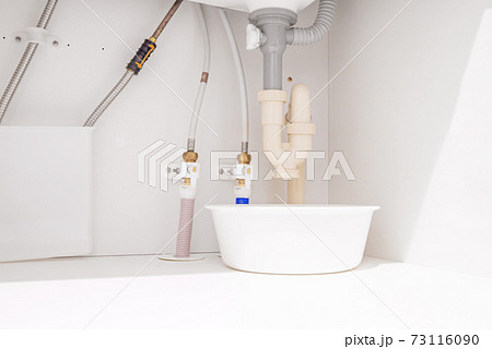 洗面所の下の排水管の写真素材