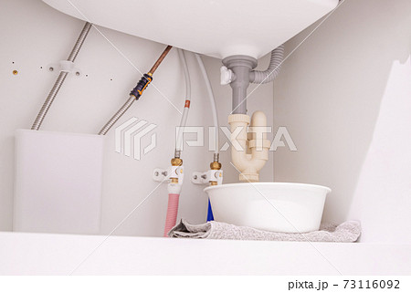 洗面所の下の排水管の写真素材