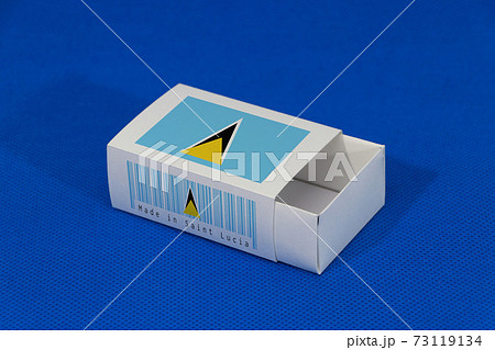 Saint Lucia flag on white box with barcode and the color of nation flag on blue background 73119134