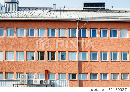 Facade of a building with rows of windows Facade of a building with rows of windows 73120327