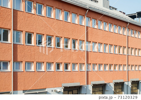 Facade of a building with rows of windows Facade of a building with rows of windows 73120329