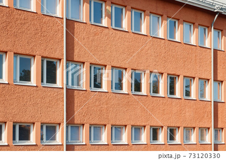 Facade of a building with rows of windows 73120330
