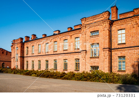 Beautiful vintage red brick building at sunny day Beautiful vintage red brick building at sunny day 73120331
