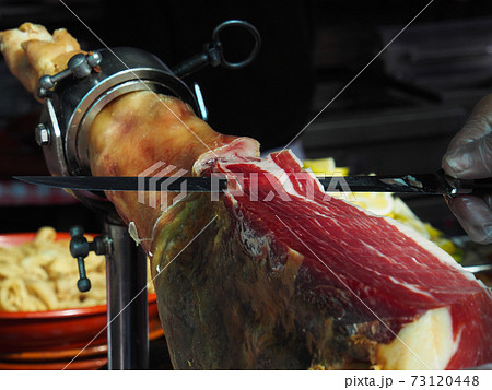 Jamon. Jamon serrano. Traditional Spanish ham on black close up. Slicing Hamon iberico 73120448