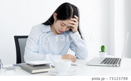 Asian female staffers are disappointed by the mistakes made, Despair or disappointment, Failure of life concept. Asian female staffers are disappointed by the mistakes made, Despair or disappointment, Failure of life concept. 73123798