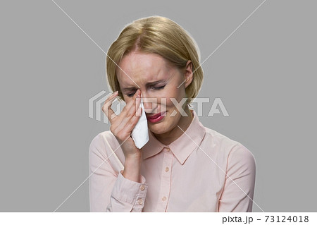 Close up upset young woman is crying. Close up upset young woman is crying. 73124018