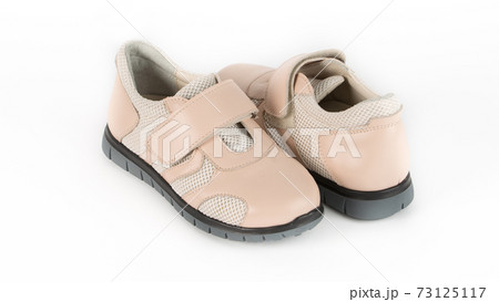 children's beige orthopedic shoes on a white background 73125117