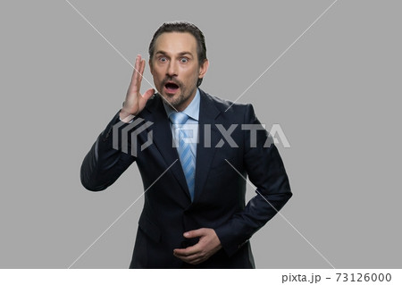 Businessman with shocked facial expression. Businessman with shocked facial expression. 73126000