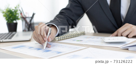 Accounting businesswomen are calculating income-expenditure and analyzing real estate investment data, Dedicated to the progress and growth of the company, Financial and tax systems concept. 73126222