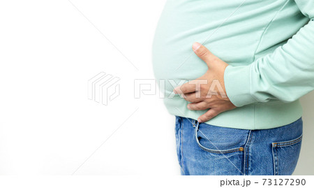 Fat man suffering from stomach pain, ulcer discomfort or metabolic disorder Fat man suffering from stomach pain, ulcer discomfort or metabolic disorder 73127290