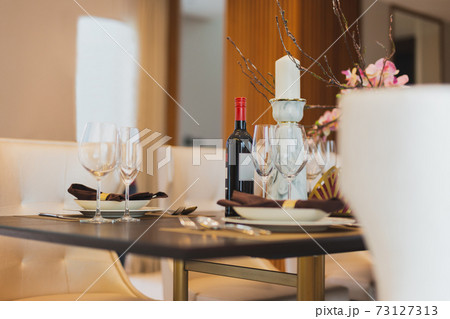 Red wine with wine glasses on the table at home. Red wine with wine glasses on the table at home. 73127313