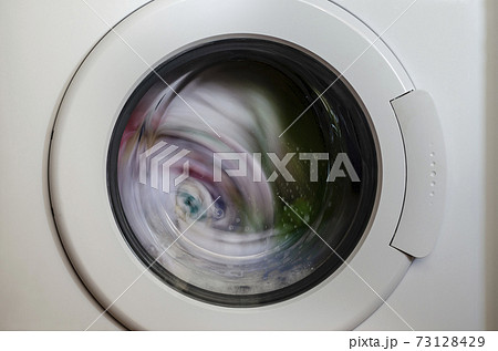 Washing machine door with rotating garments inside Washing machine door with rotating garments inside 73128429