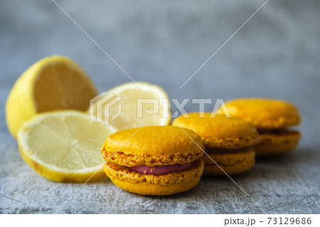 yellow lemon macaroni cookies on a gray background 73129686