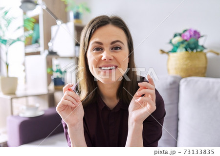 Female mentor, tutor, teacher looking at webcam, closeup face Female mentor, tutor, teacher looking at webcam, closeup face 73133835