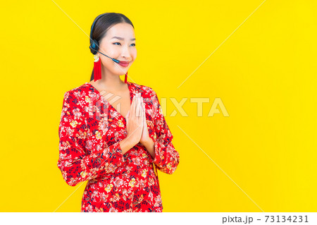 Portrait beautiful young asian woman with headset for customer call center Portrait beautiful young asian woman with headset for customer call center 73134231