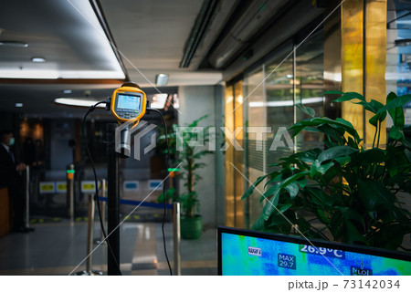 People waiting for temperature check by thermoscan People waiting for temperature check by thermoscan 73142034