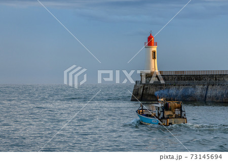 Lighthouse of grande jetee in les Sables d'Olonne in France. Lighthouse of grande jetee in les Sables d'Olonne in France. 73145694
